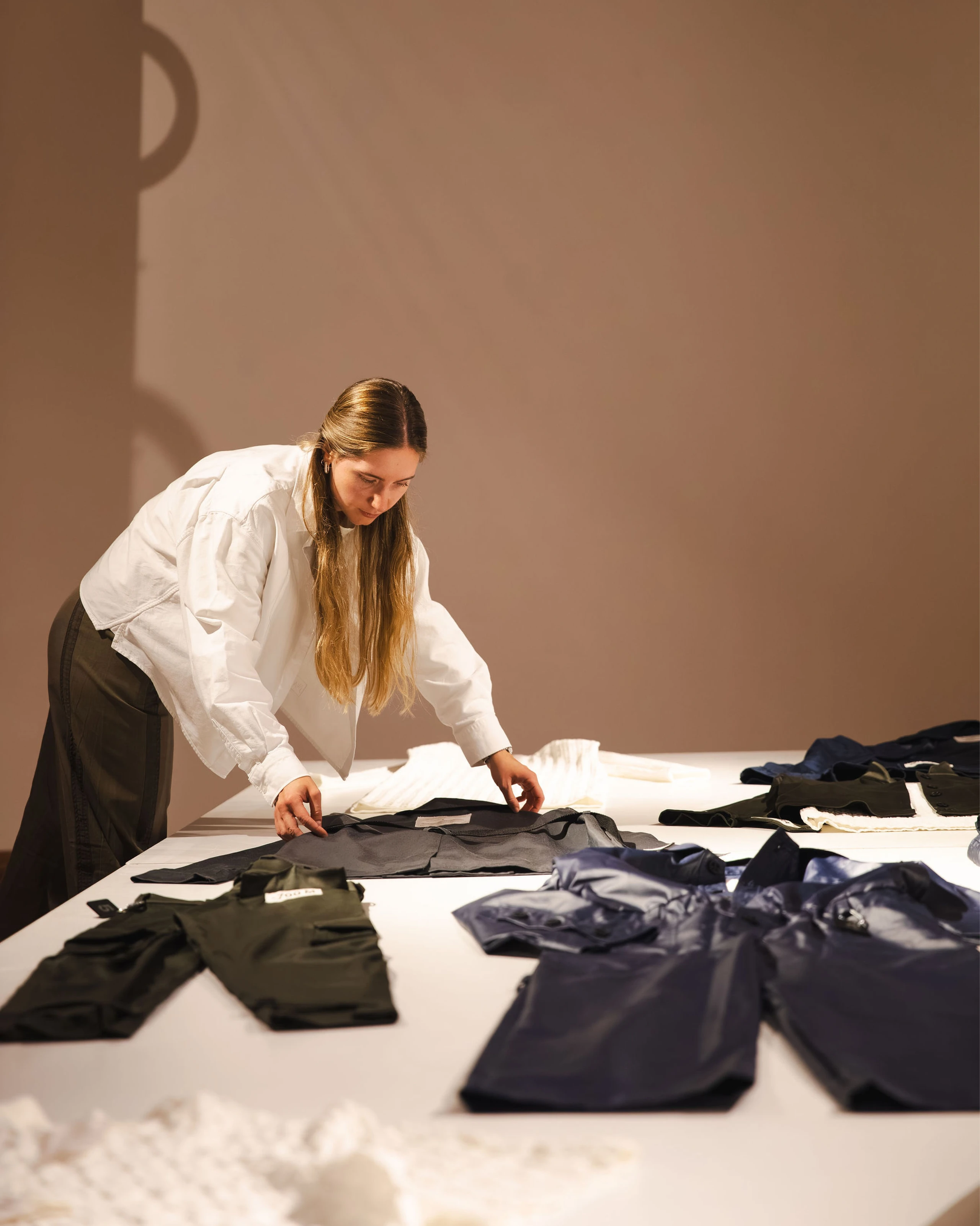 Final touches before exhibition opening by the author Alison Ivasic. 