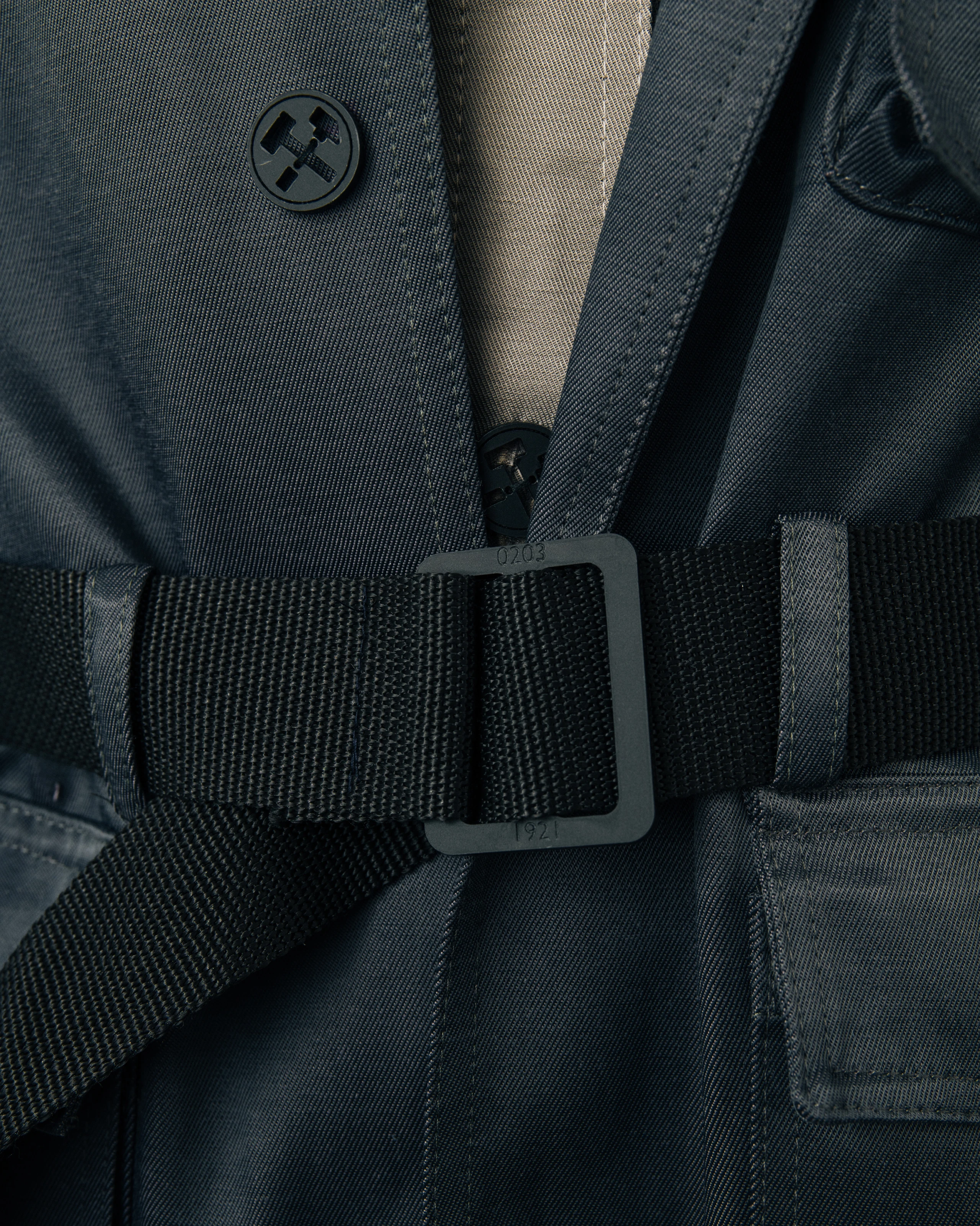 Custom buttons and trims details made of matte plexiglass for Kovari collection. 