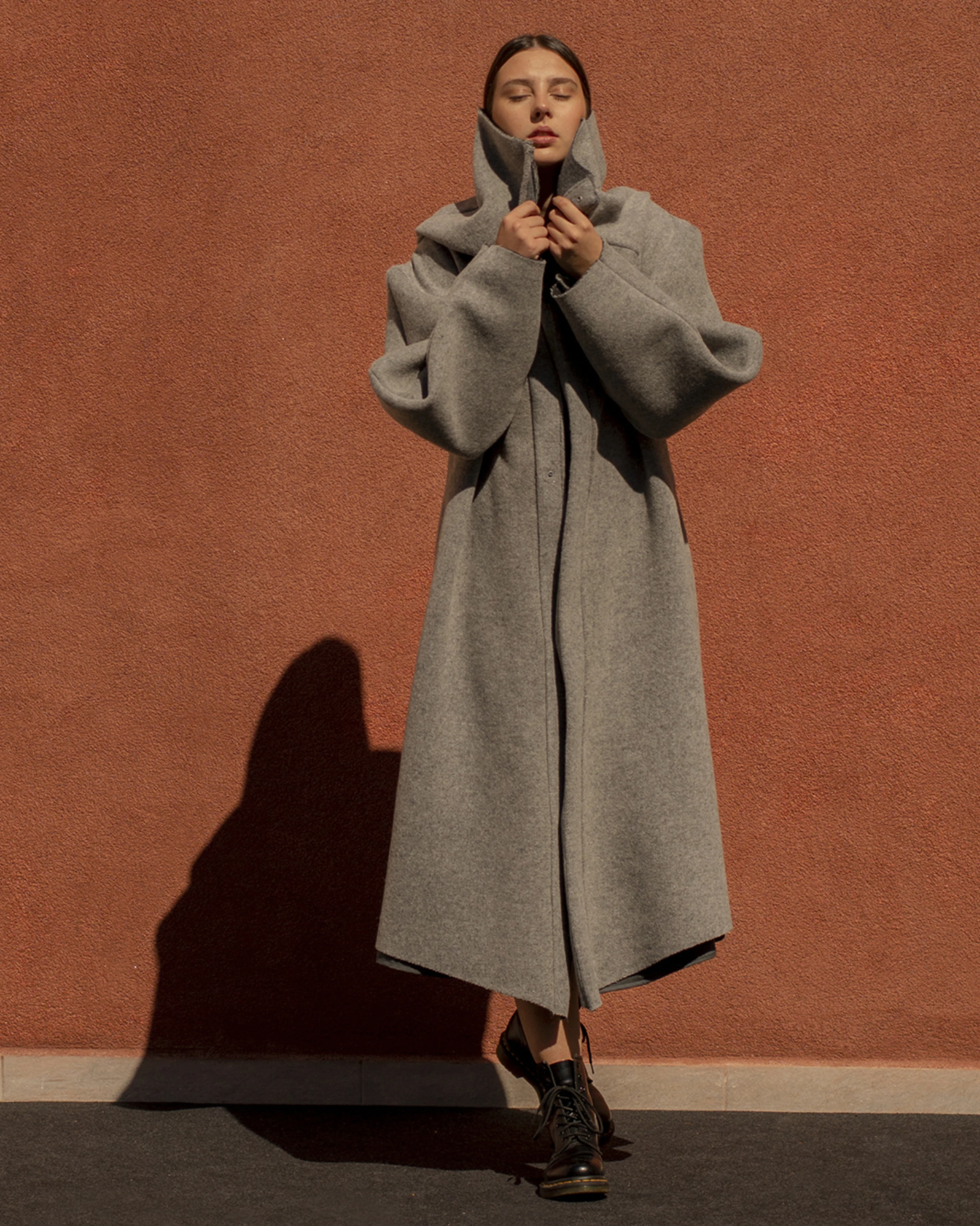 Gray wool coat from Forme collection. 