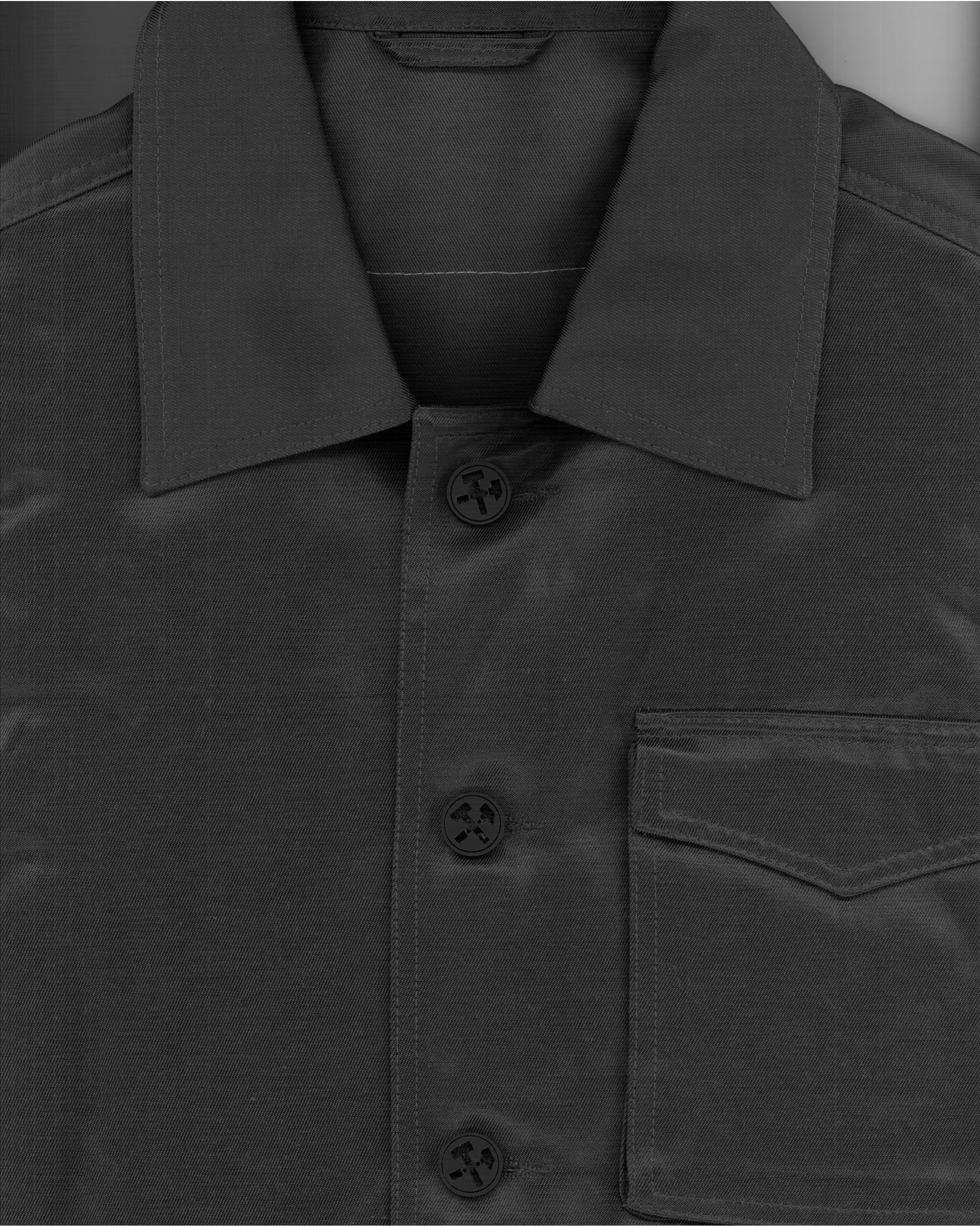 Scanned gray jacket with custom buttons from Kovari collection. 