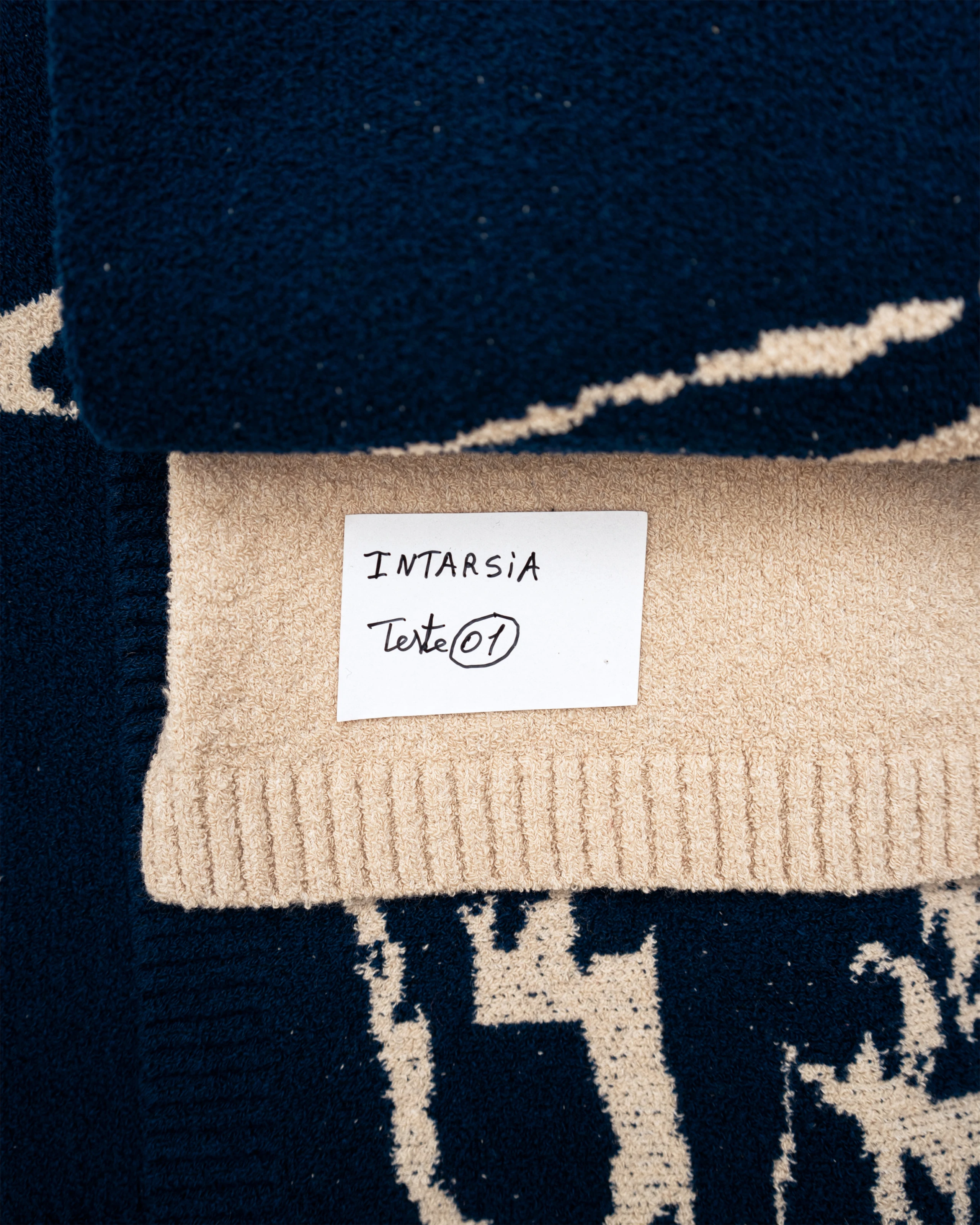 Intarsia and jacquard knitwear samples.