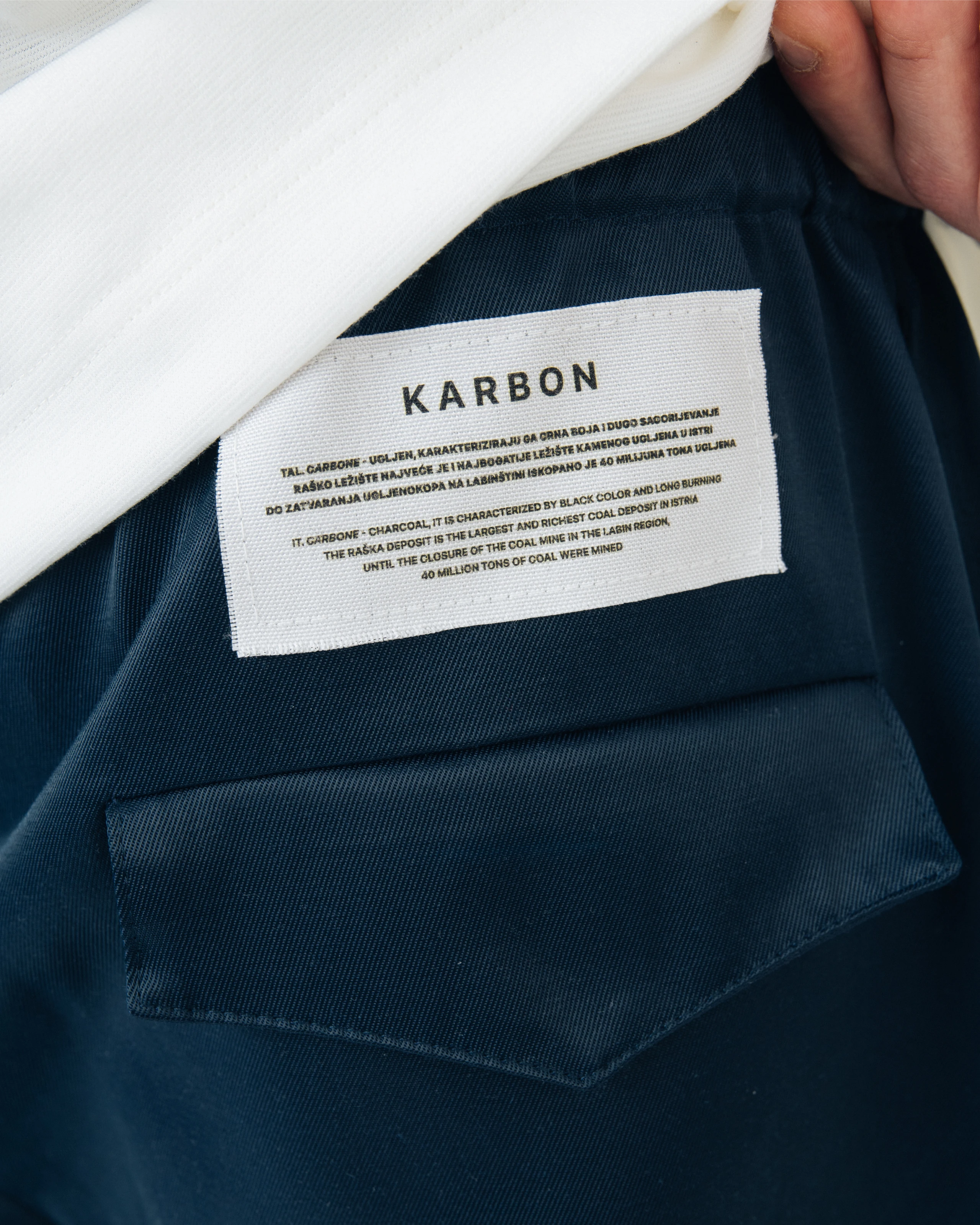 Blue work pants with carbon label detail from Kovari collection.