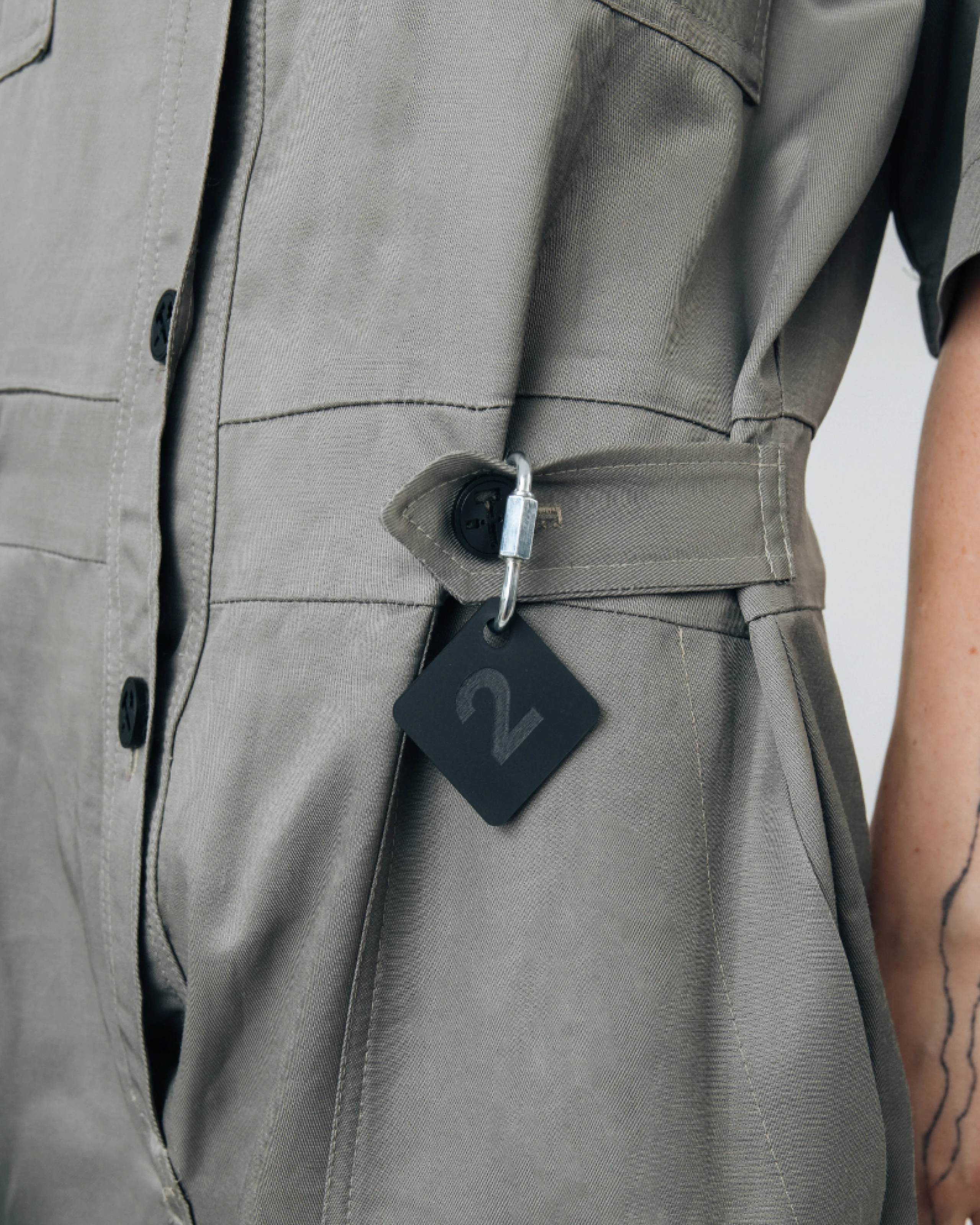 Women's jumpsuit details from Kovari collection. 