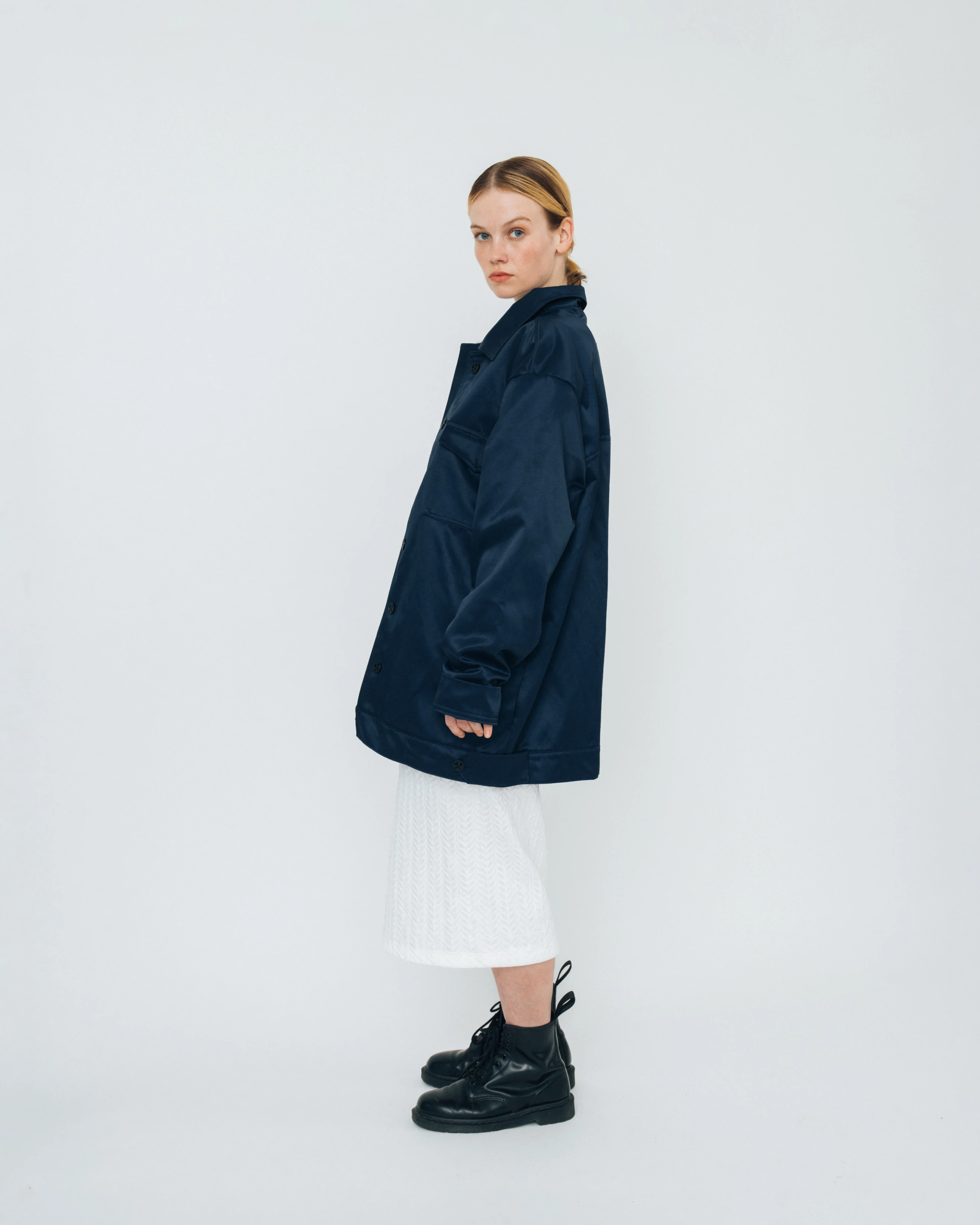 Kovari collection women's outfit made of blue oversized jacket and dress with all over puff print. 